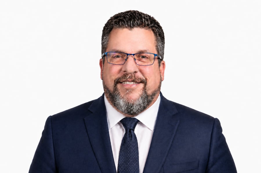 Brett Conger, Esq.