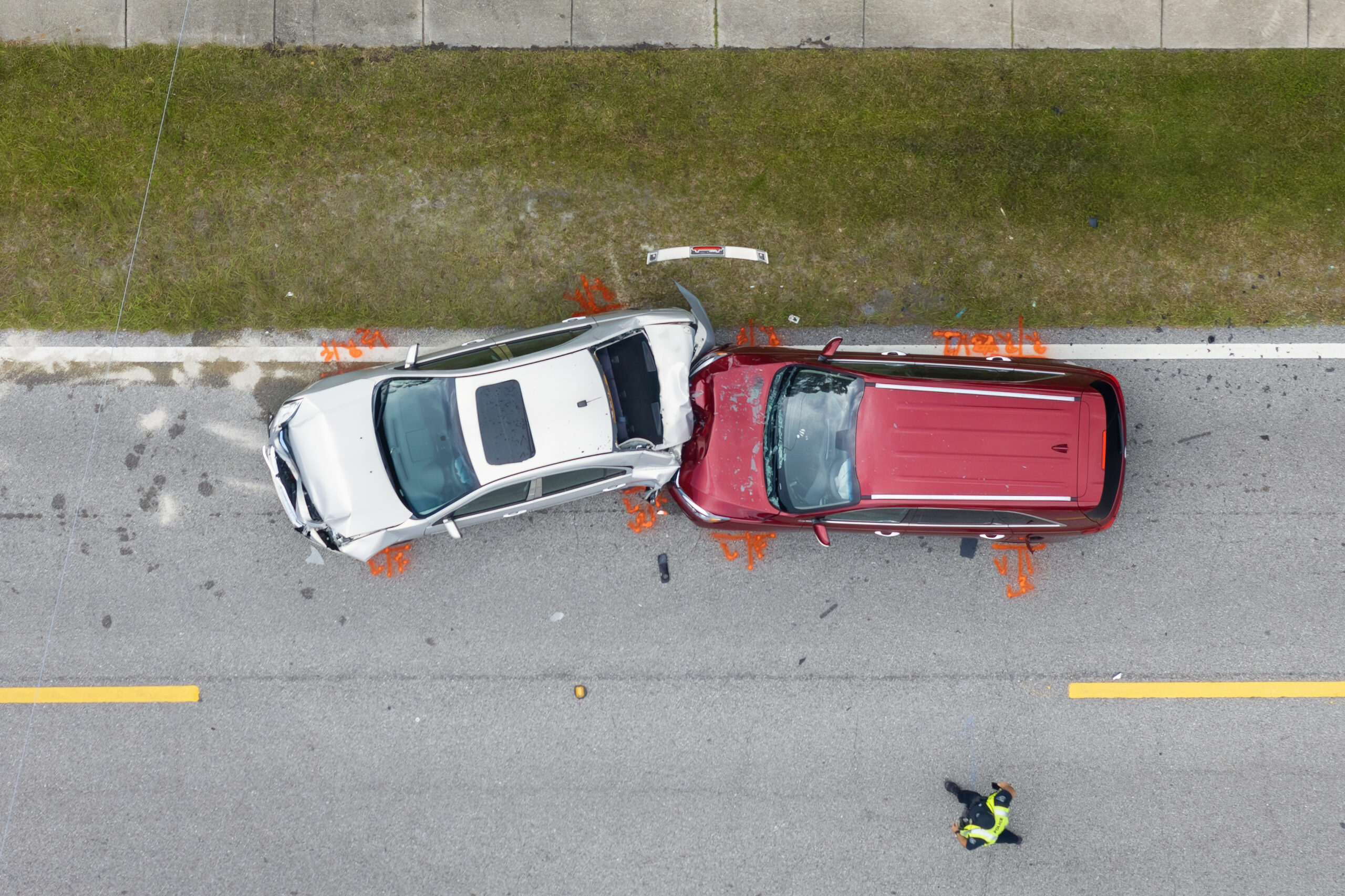 Car crash with two vehicles collided at traffic accident site on American street